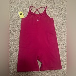 All In Motion pink Onesie